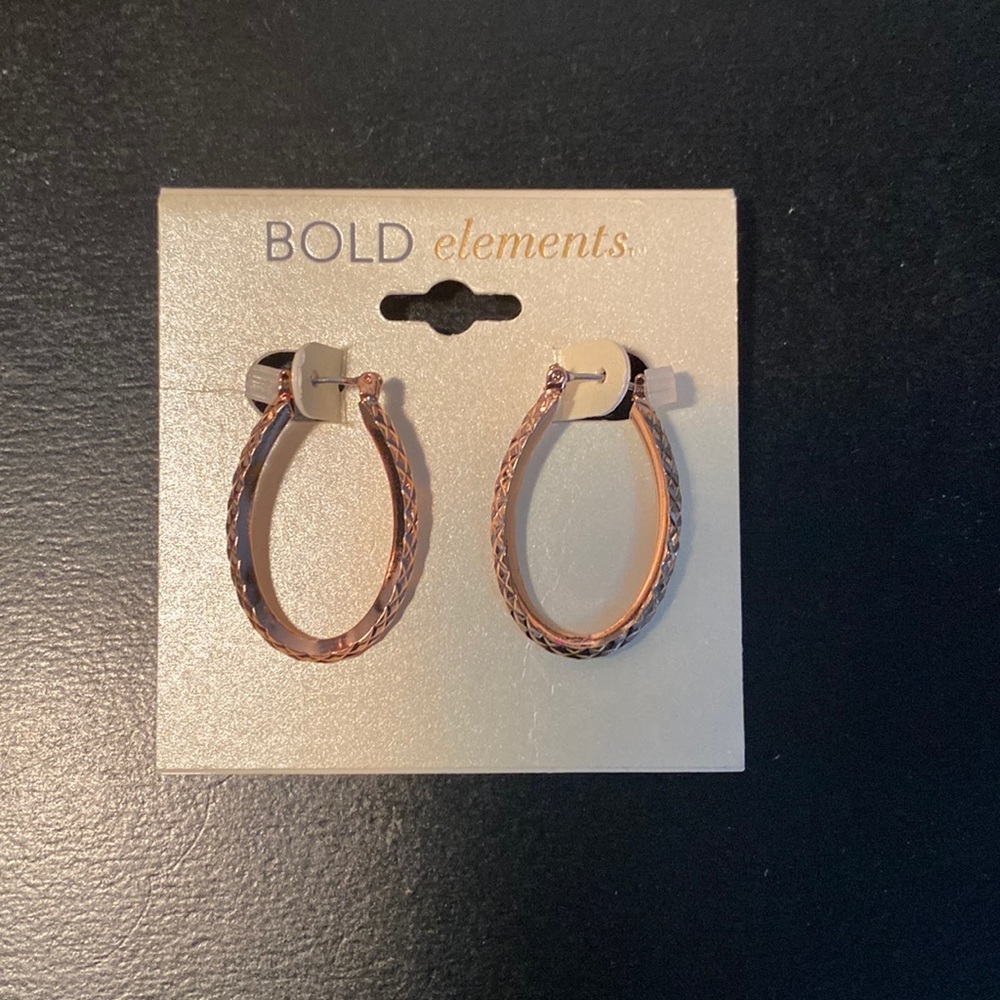 Earrings near wore, rose gold hoops